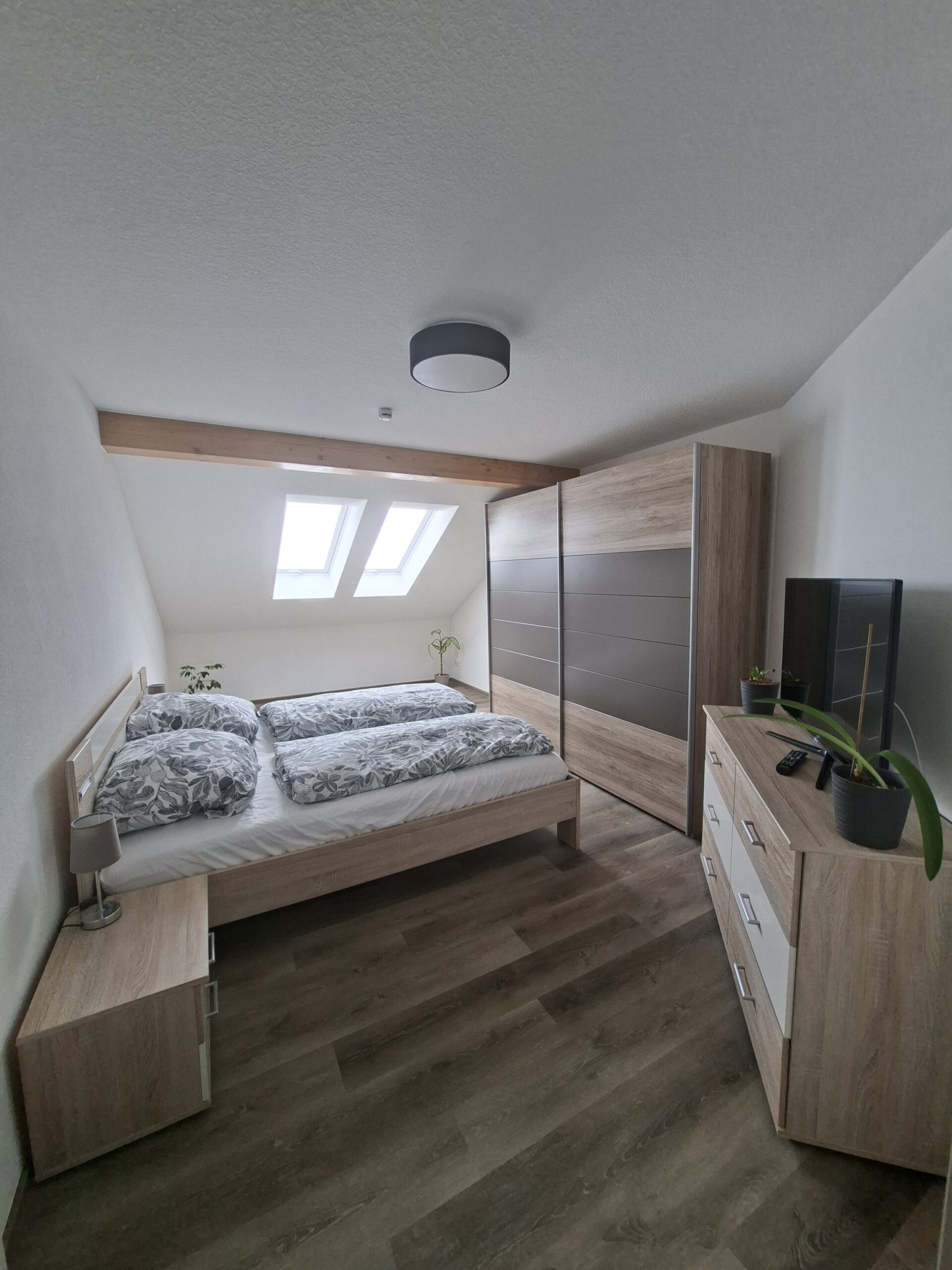 Schlafzimmer mit Doppelbett in Appartement 1